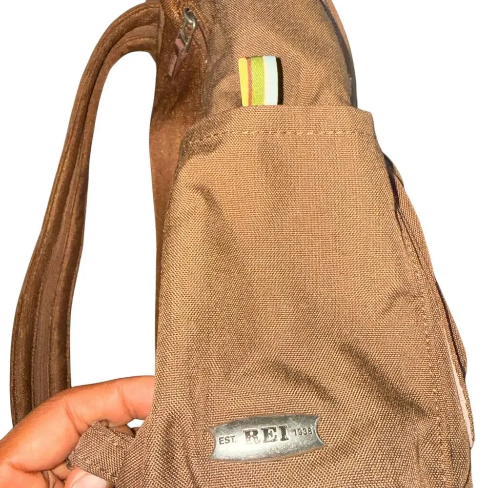 REI convertible backpack with Sling Zipper Brown w/silver hardware and pockets